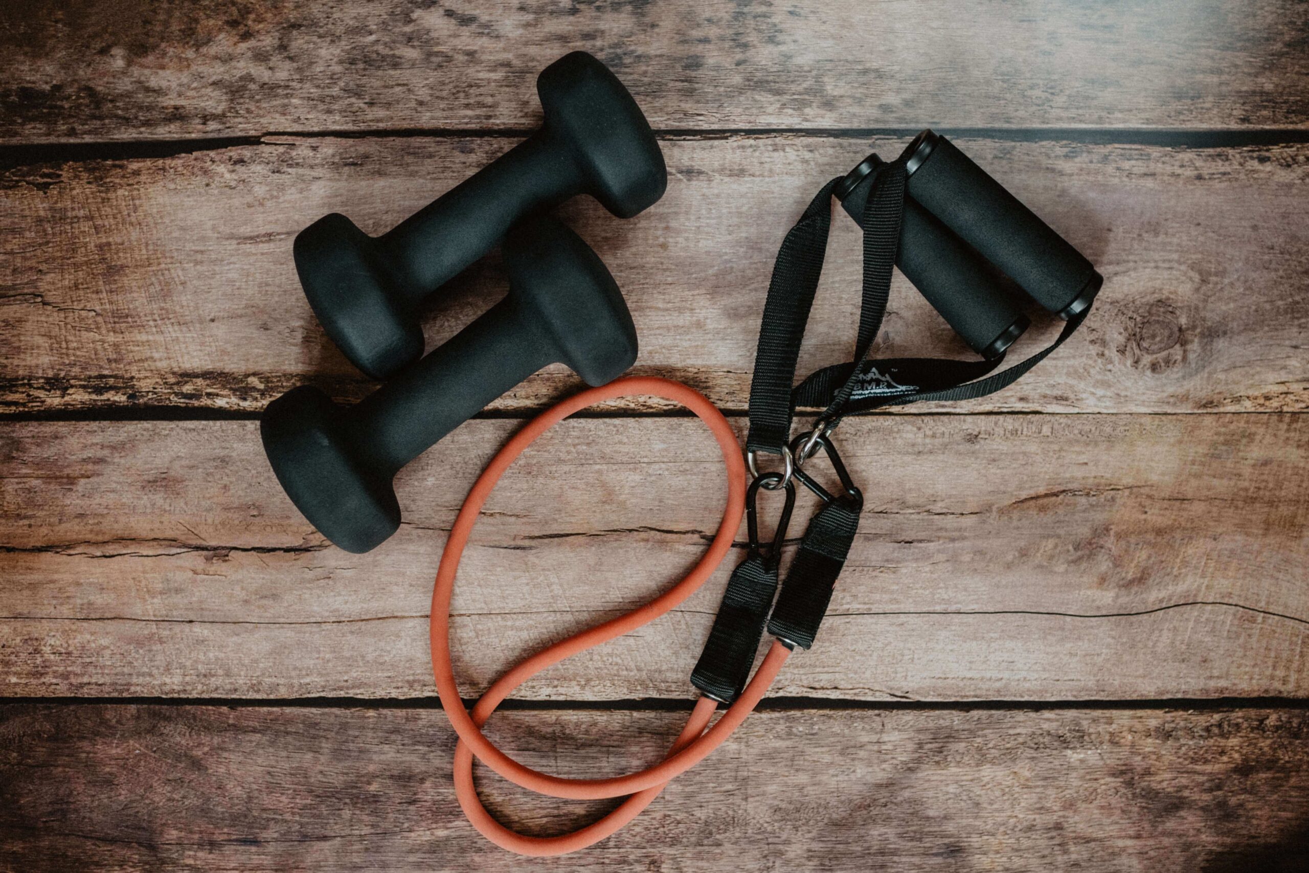 dumbbells and resistance band for at-home workouts