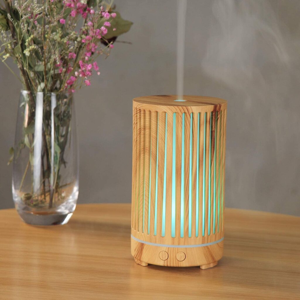 bamboo oil diffuser on wooden table